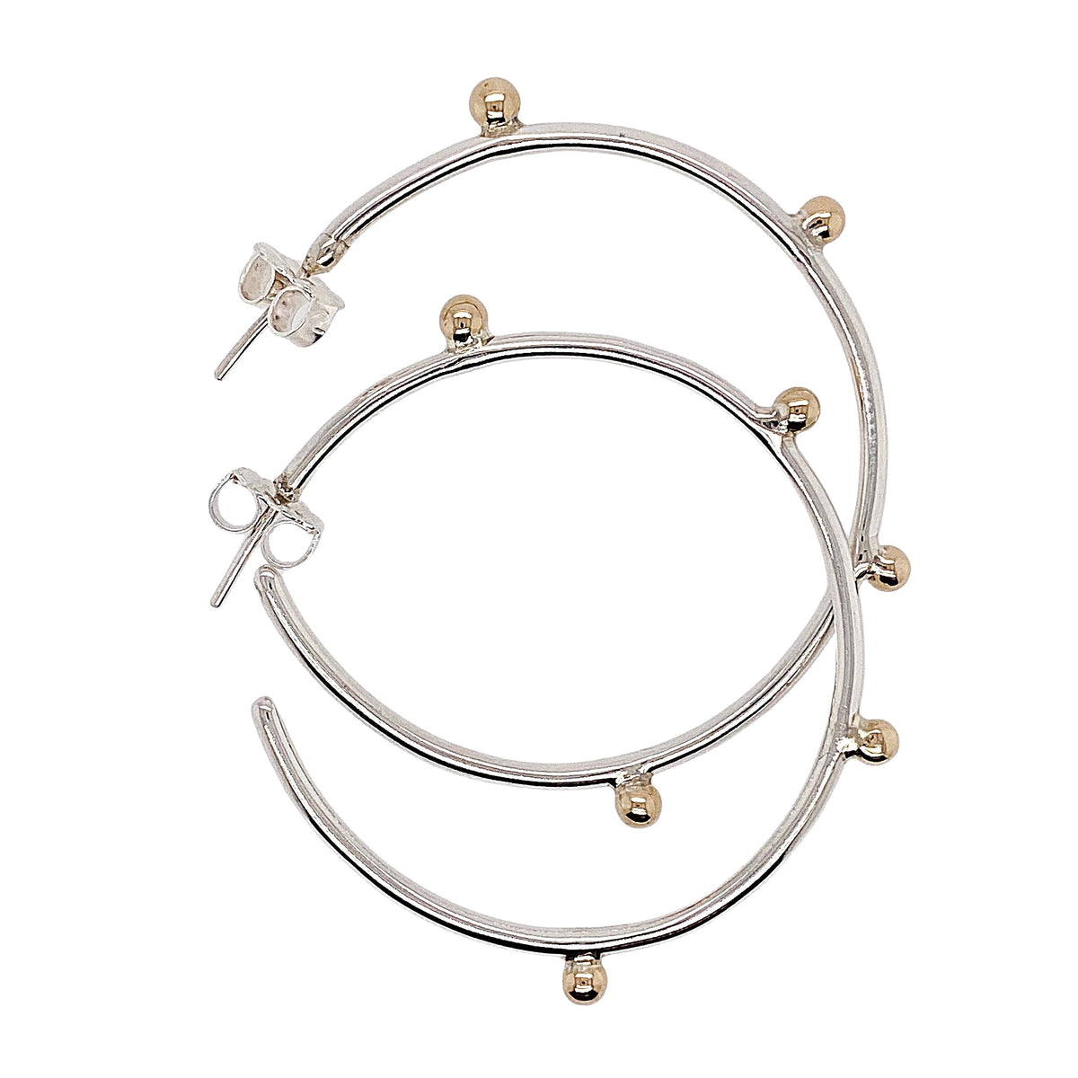 Dreamcatcher hoop earrings in sterling silver with gold accents.