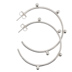 Dreamcatcher hoop earrings in sterling silver.