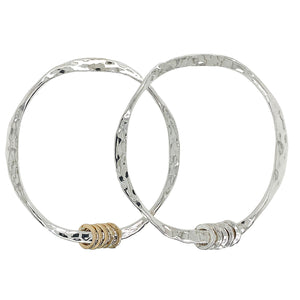 Jangle bangle in sterling silver. 