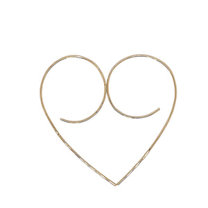 Wire heart earrings in gold.