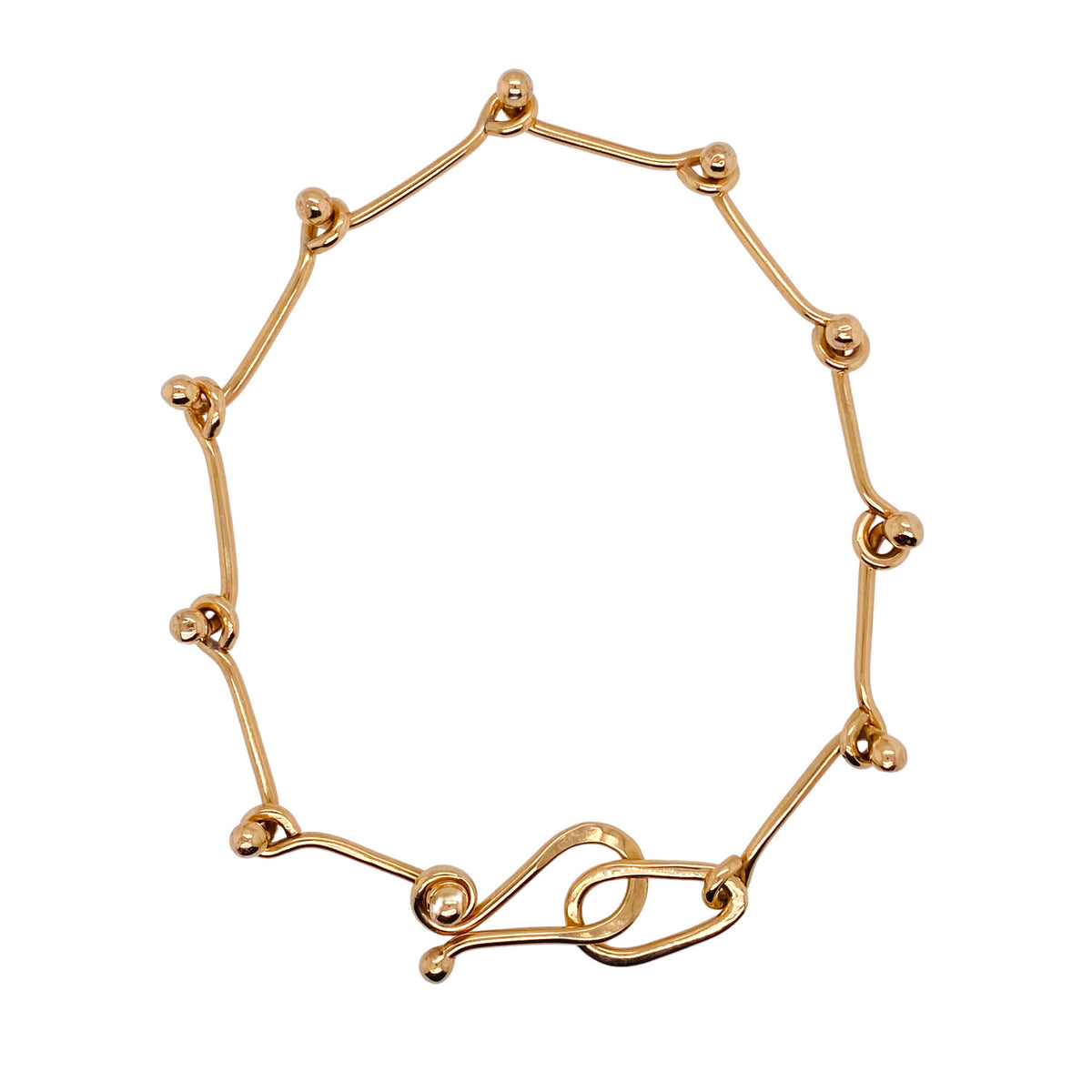 Ball link bracelet in 14 kt gold. 