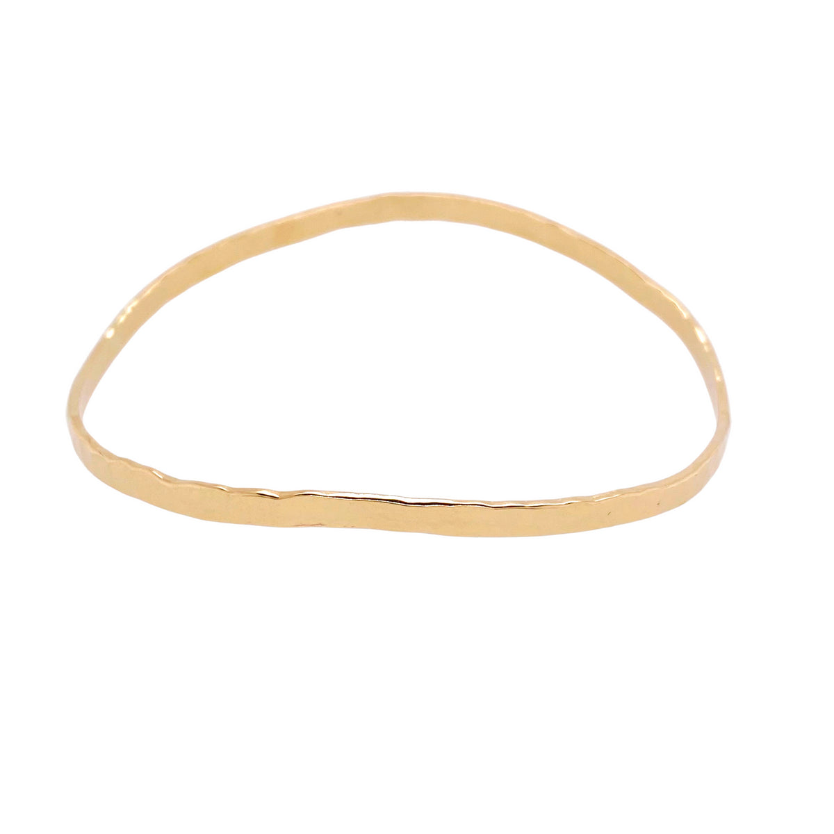 Hammered bangle in yellow gold