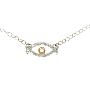 Sterling silver and 14k yellow gold love eye necklace.