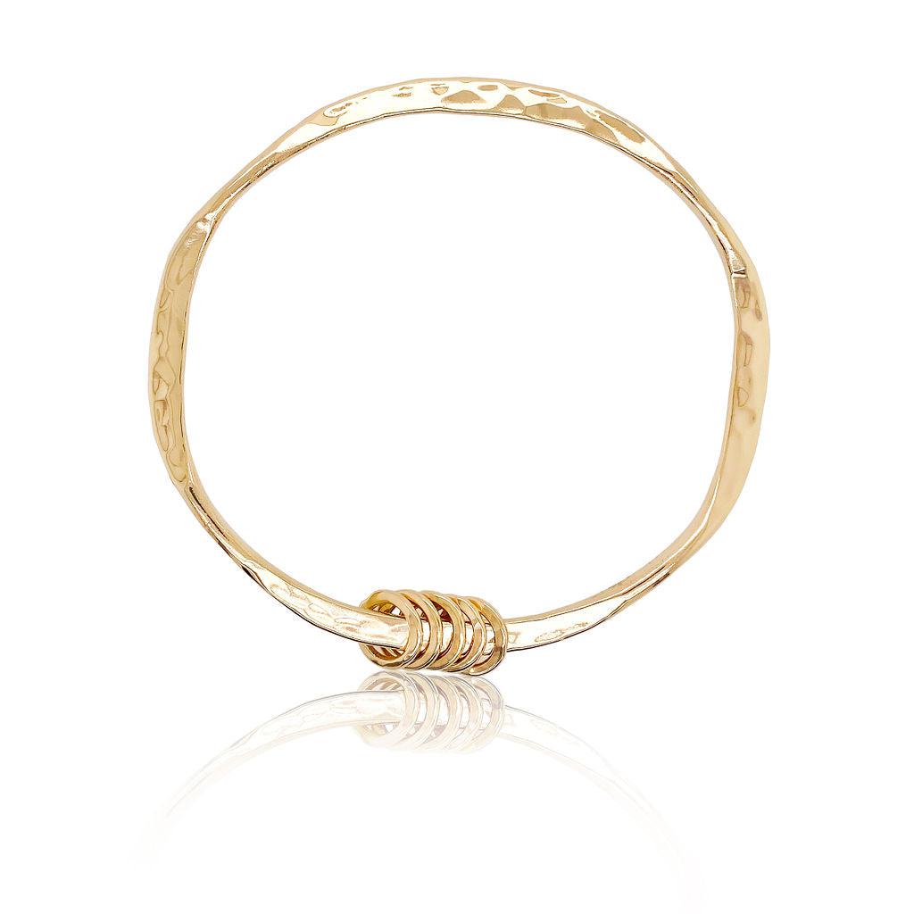 Jingle jangle bangle in 14k yellow gold.